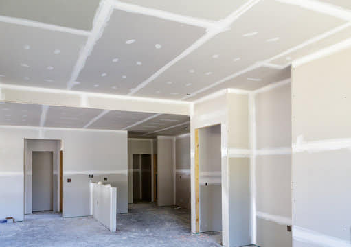 Fox Construction team working on drywall project
